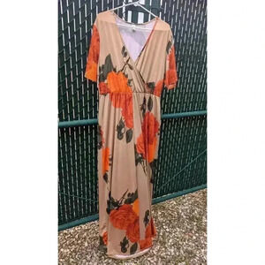 Women's maxi length short sleeve dress with orange floral pattern. Size XL